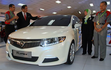 Model on Proton Confirms Persona Replacement Model In 2012   Just Another Male